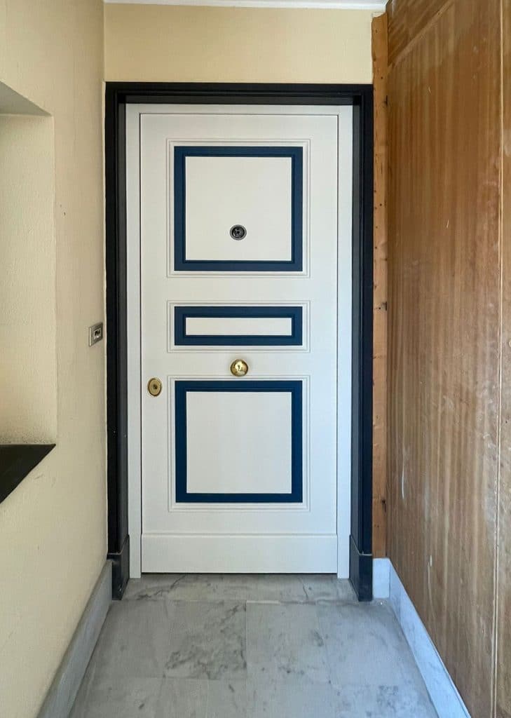 white and blue armoured door
