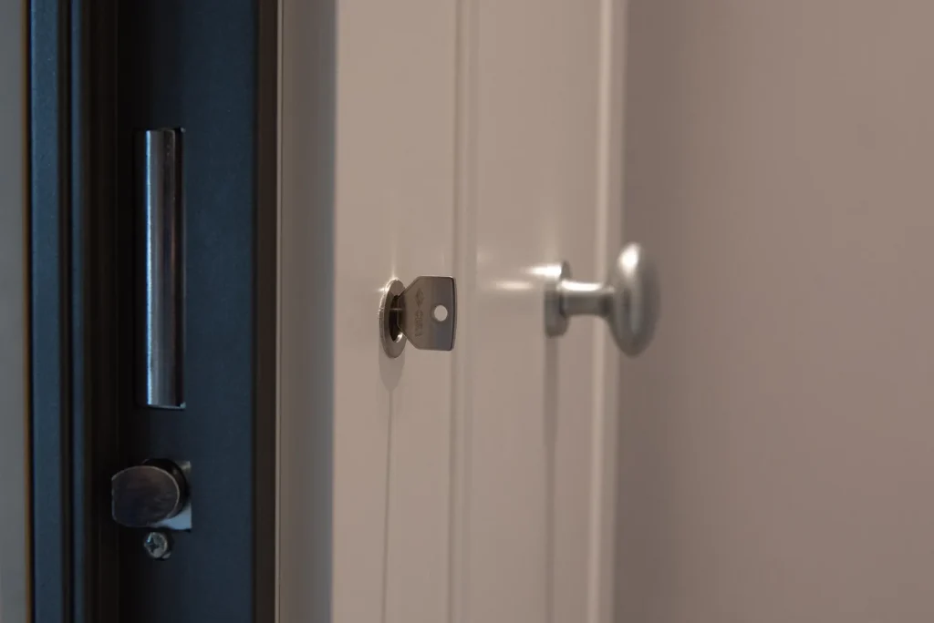 mechanical automatic armoured door lock with key in the cylinder