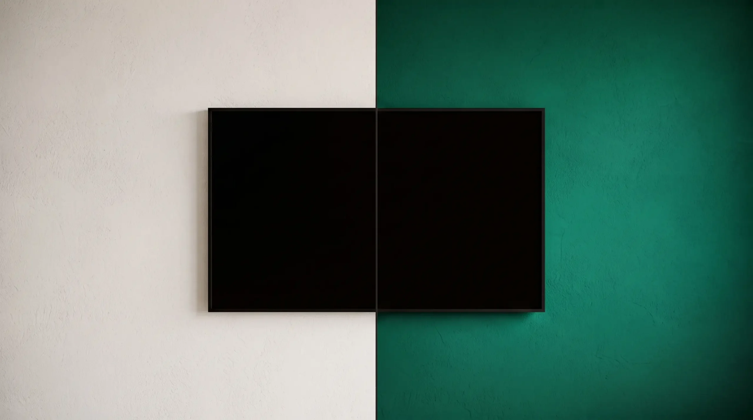 Black armoured door compared against a white wall and a coloured wall